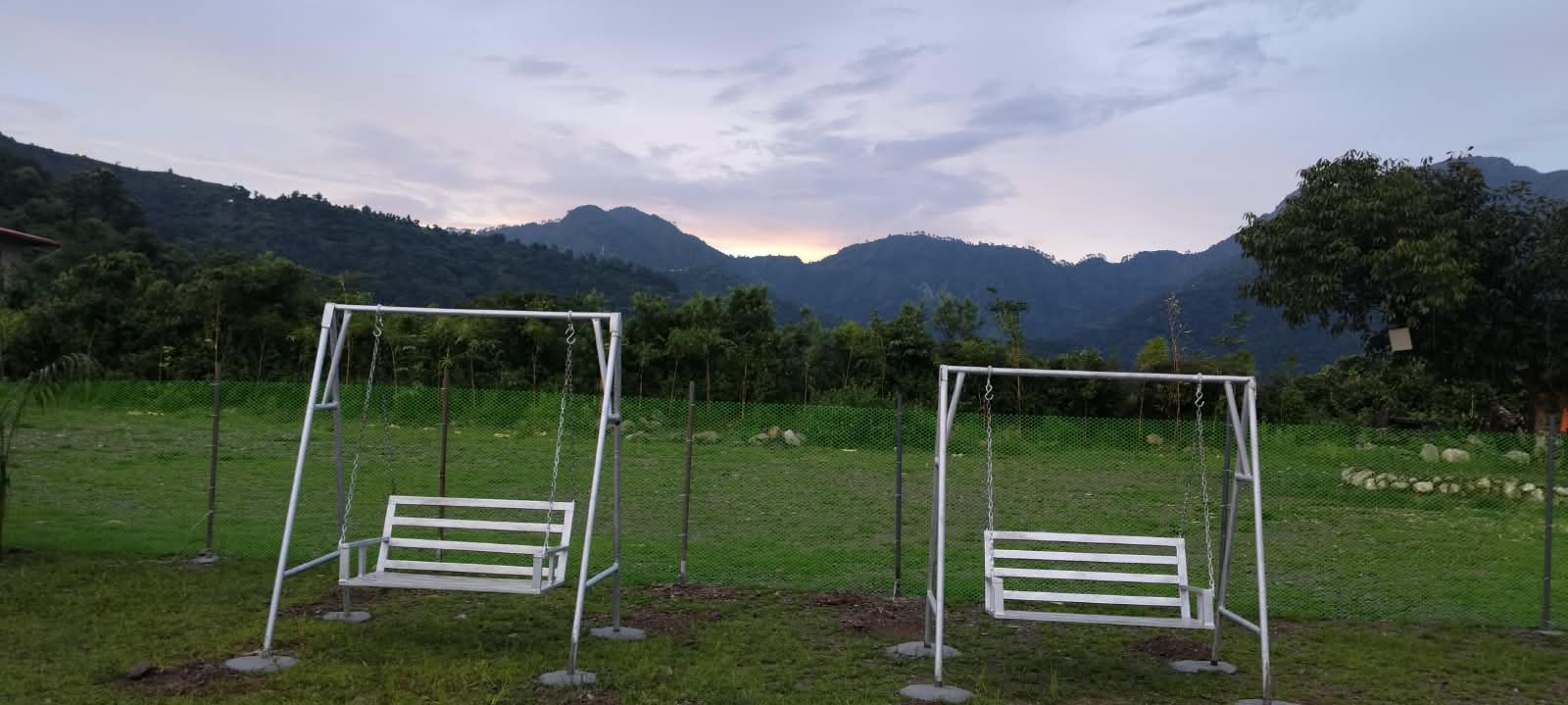 Mountain landscape and swings